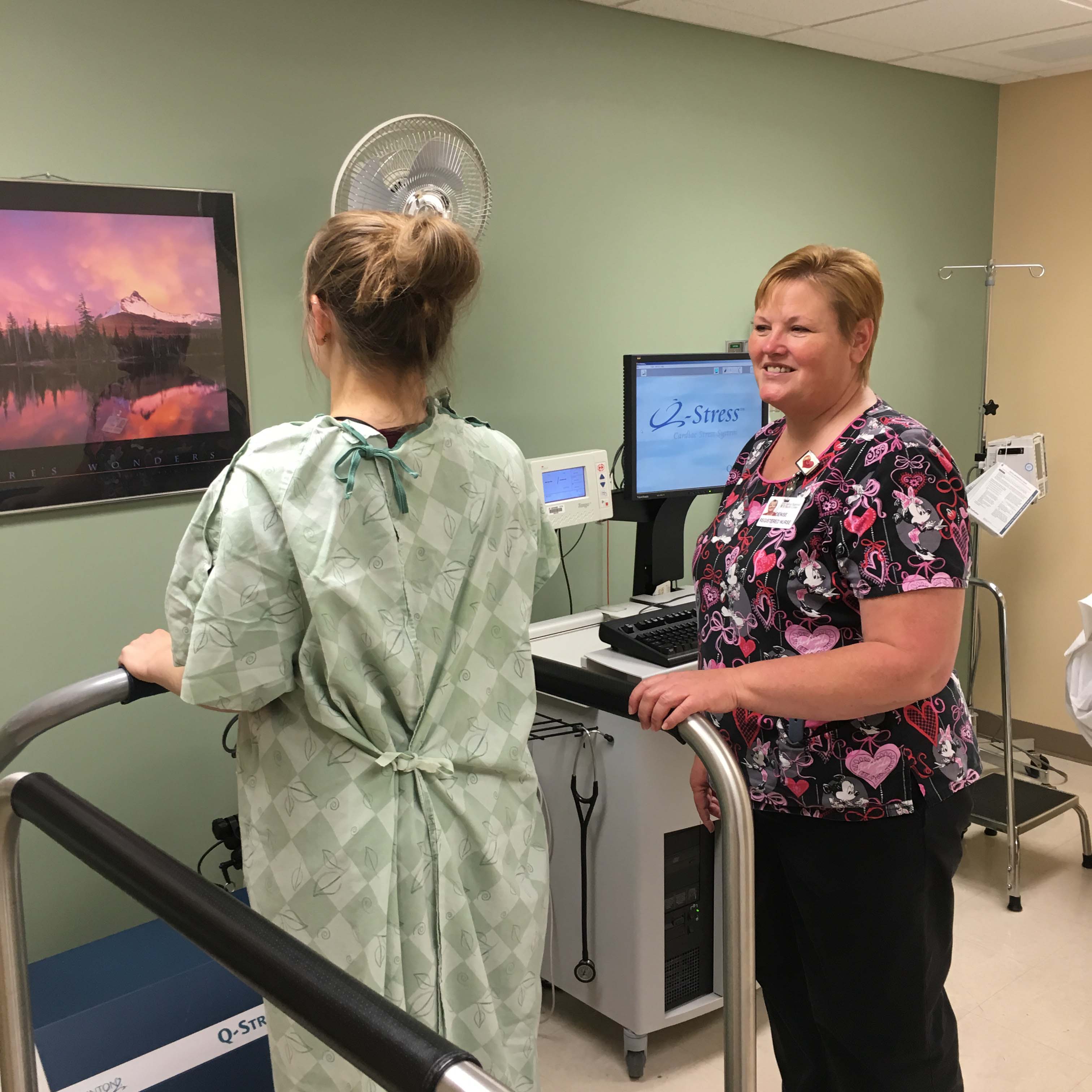 SRHC employee helping patient